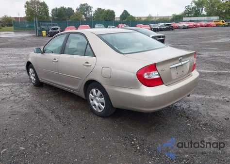 2003 Toyota Camry Le z USA, uszkodzony, nr VIN 4T1BE32K83U123371